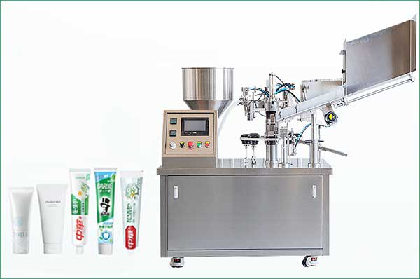 cosmetic tube filling and sealing machine